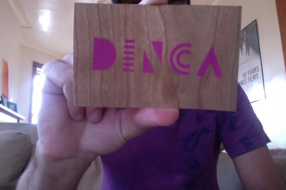 dinca logo screenprinted on wood