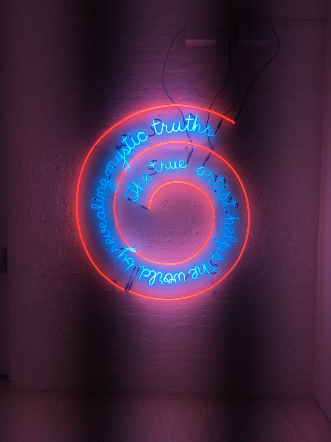 The True Artist Helps the World by Revealing Mystic Truths (Window or Wall Sign) by Bruce Nauman, 1967, Neon tubing with clear-glass tubing, suspension frame